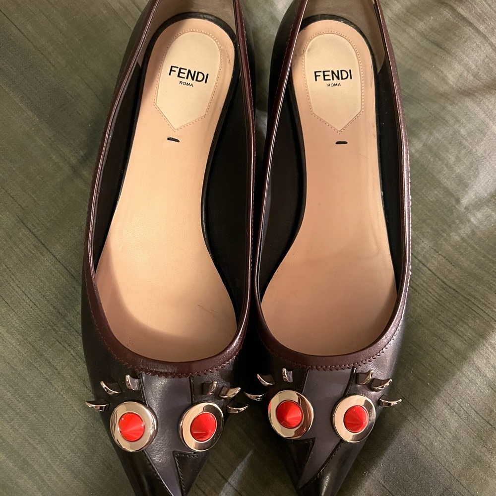 Fendi Women's Black leather 1 inch heels with a distinctive pattern.